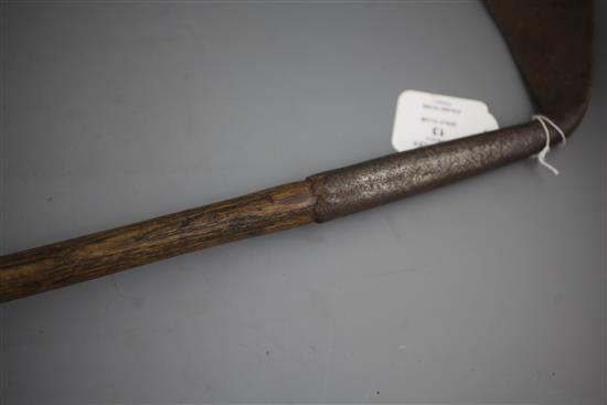 A rare 17th/18th century left handed spur toed golf club, length 42.5in.